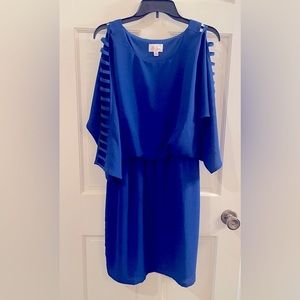 Gorgeous royal blue Ivy Lane dress with bilateral cut outs down the sleeves.